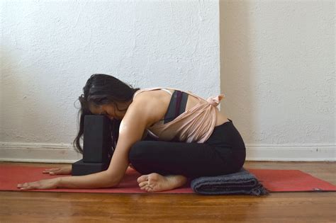 yoga poses for anxiety - sukasana - cross legged forward fold with ...