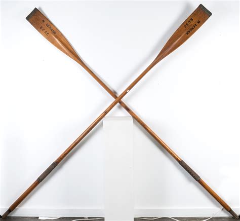 A pair of antique sculling oars marked “M. Denham, E.C.S.C.” - Leski Auctions | Find Lots Online