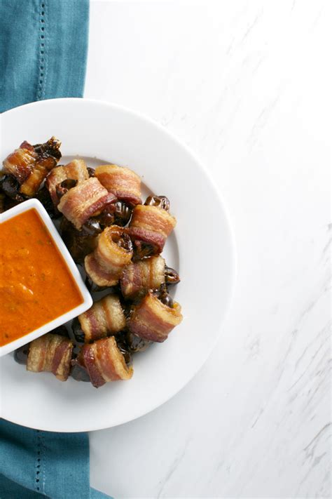 Bacon Wrapped Dates with Roasted Red Pepper Dipping Sauce - Stuck On Sweet