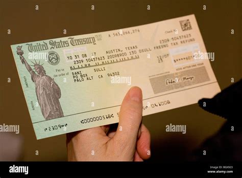 Tax refund check Stock Photo - Alamy