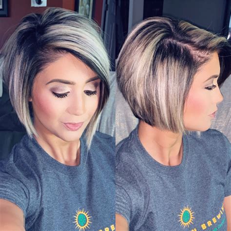 Asymmetrical stacked bob with platinum blonde highlights | Blonde highlights short hair, Short ...