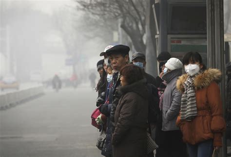 Beijing chokes on off-the-charts air pollution as thick smog settles ...