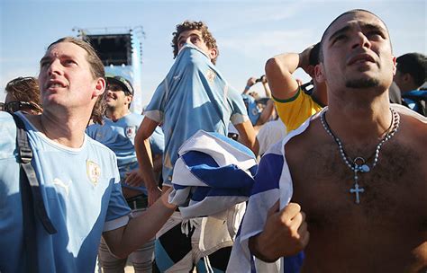 World Cup: Uruguay fans upset with Suarez over biting incident - Rediff ...