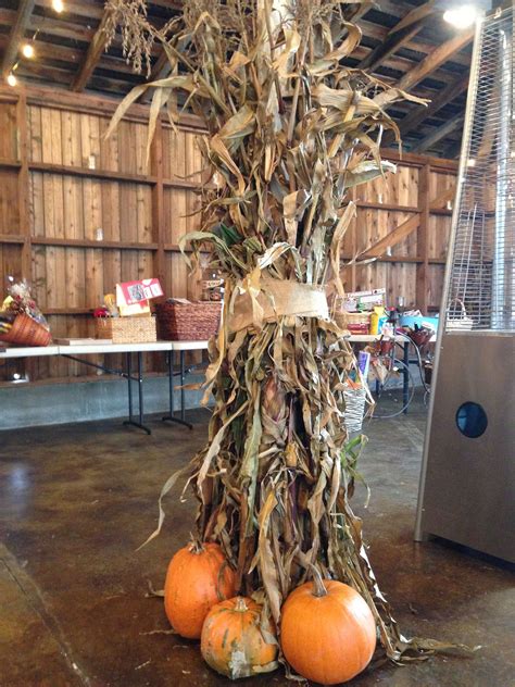 Festive fall cornstalks and pumpkins | Farm decor, Pumpkin, Decor