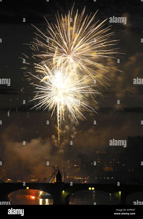 Fire crackers bursting in the sky over the bridge at night Stock Photo - Alamy