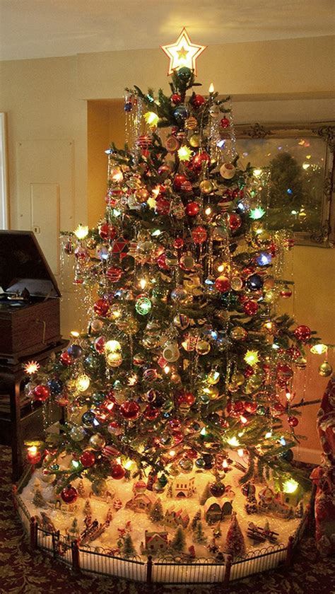 a decorated christmas tree in a living room