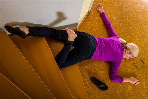 Accident Woman Falling Down The Stairs At Home Stock Photo - Download ...