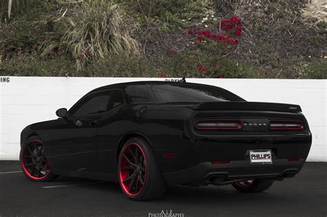 Threatening Look of Blacked Out Dodge Challenger SRT Highlighted by Red Wheels and Calipers ...