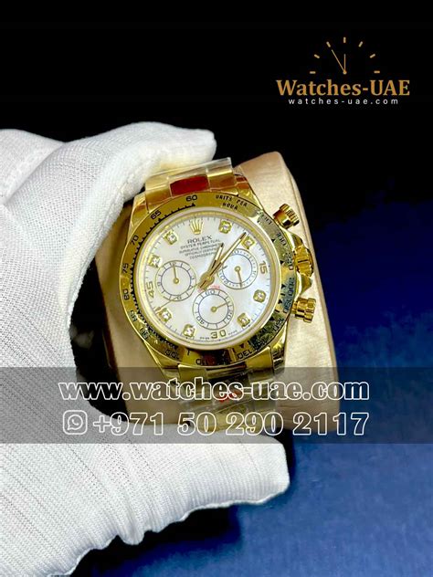 Rolex Daytona White Dial Yellow Gold Stoned Numeric - Watches UAE