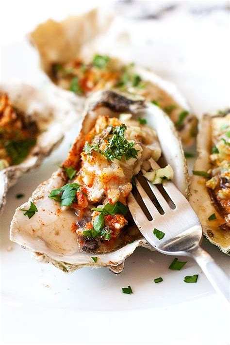 This is a super simple and absolutely delicious recipe. Oysters on the half shell are topped ...