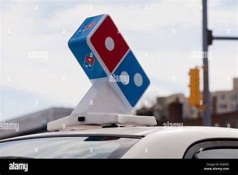 Domino's pizza delivery car sign - USA Stock Photo - Alamy