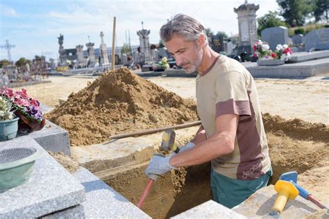 Digging a grave and gravedigger — Stock Photo © photography33 #129448280