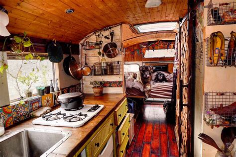 Skoolie School Bus Conversion Kitchen is so gorgeous and homey! Look at those cute dogs too on ...