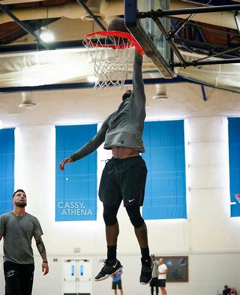 Kyrie Irving Dunking in an Indoor Gym