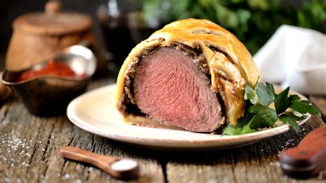 Add An Extra Layer Of Flavor To Beef Wellington With Prosciutto