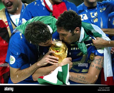 Italys marco materazzi barzagli kiss the fifa world cup hi-res stock ...