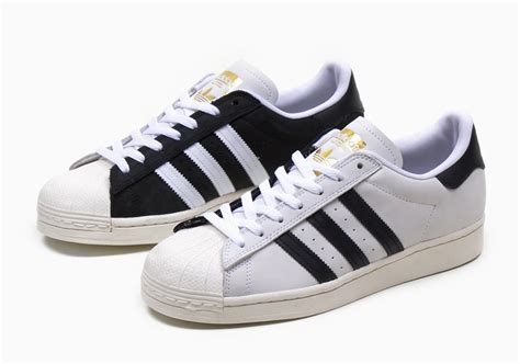 The Iconic White and Black adidas Superstar Combine Into One Split-Colored Release - SneakerNews.com