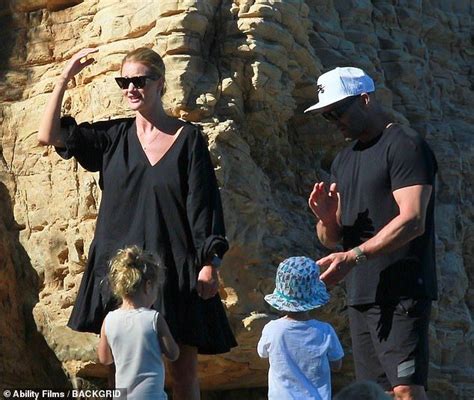 Lovely times: Rosie Huntington-Whiteley giggled as she and Jason ...