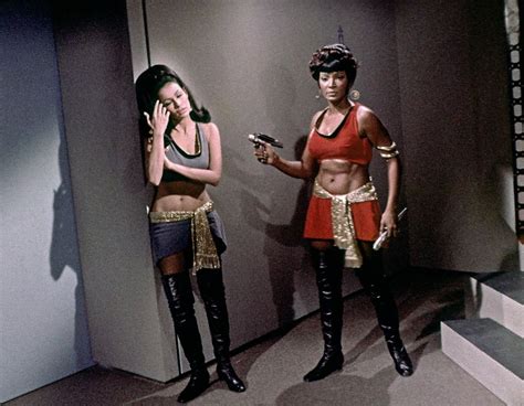 A fun pose with Lieutenant Uhura holding at phaser point Marlena Moreau ...