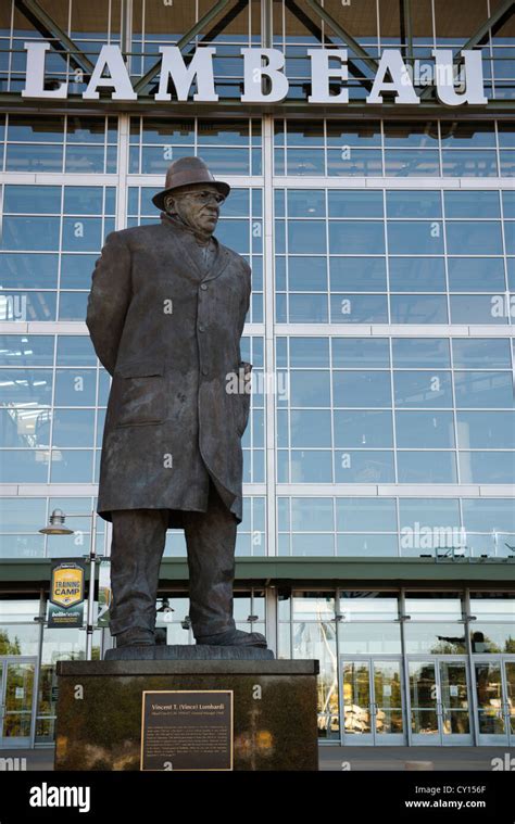 Statue of Curly Lambeau outside the stadium at Lambeau Field, home of The Packers football team ...