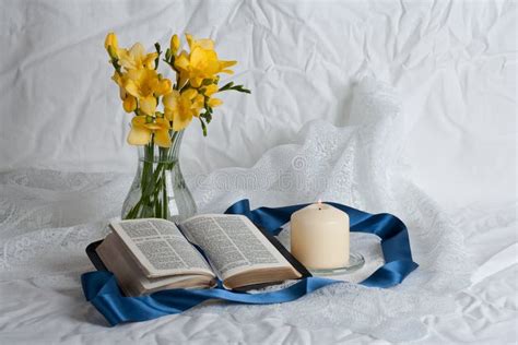 Open Bible and flowers stock photo. Image of bible, candle - 13637356