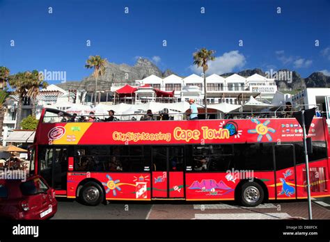 Red Cape Town City Sightseeing tourist bus in Camps Bay Stock Photo - Alamy