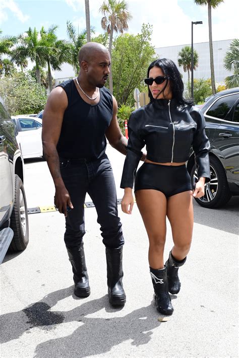 Kanye West grabs new girlfriend Chaney Jones' butt in skintight leather shorts during the couple ...