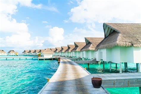 Premium Photo | Tropical maldives resort hotel and island with beach and sea