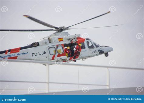 Rescue Helicopter Loading Passenger from Cruise Ship Editorial Photography - Image of coast ...