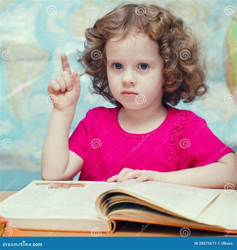 Little Girl Reading A Book Royalty Free Stock Photography - Image: 28575677