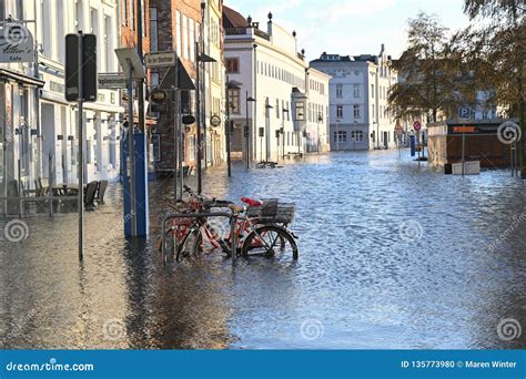 LUEBECK, GERMANY, JANUARY 2, 2019: Bicycles in the Flood of the River ...