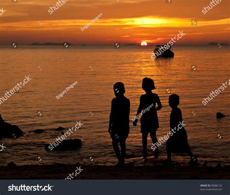 Silhouette Children Playing On Beach Sunset Stock Photo 50086132 ...