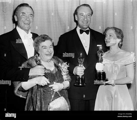 From left to right: Dean Jagger, who made made the presentations, stands with actors Josephine ...