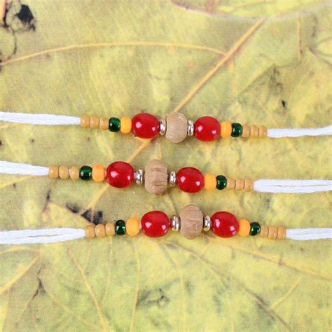 Wooden and Mauli Color Beads Three Rakhi Threads - Zakarto