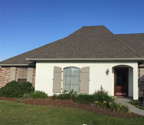 Stucco House Colors With Black Roof