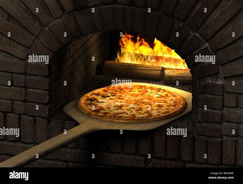 Pizza resting on a wooden spatula inside a sood fired brick pizza oven ...