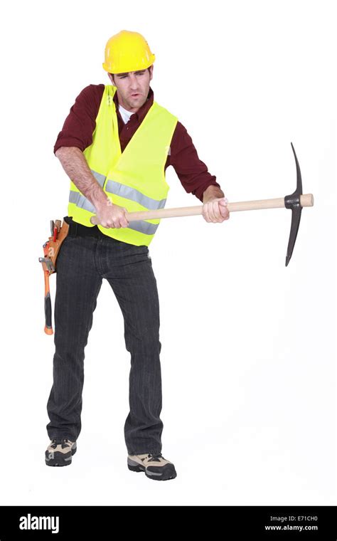 Man wielding axe Stock Photo - Alamy