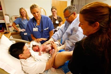 Astonishing pictures emerge of MAN giving birth for the THIRD time