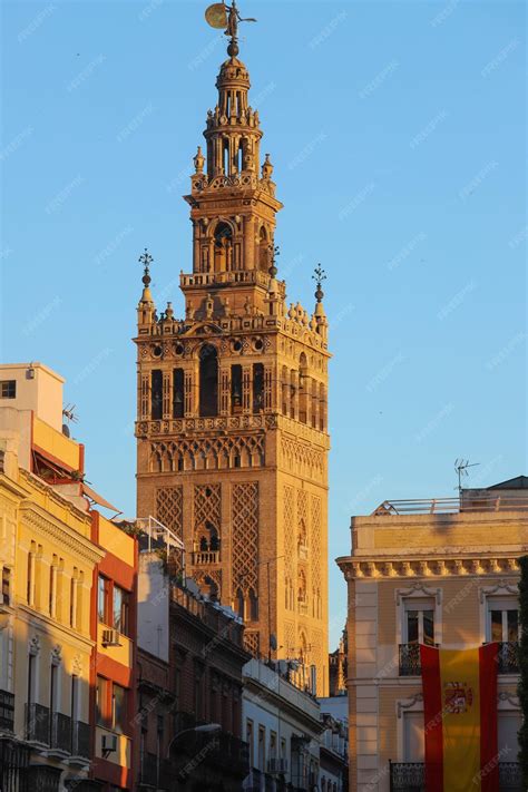 Premium Photo | Famous tower of giralda islamic architecture built by the almohads and crowned ...