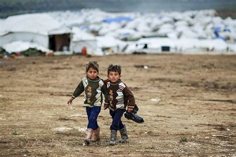 Syrian boys, whose family fled their home in Idlib, walk t… | Flickr