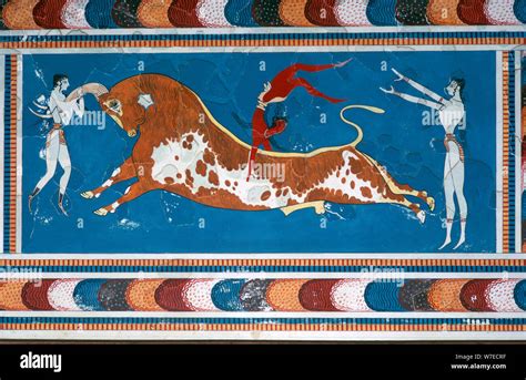 Reconstruction of the 'Bull-leaping' fresco from the Minoan Royal palace at Knossos. Artist ...