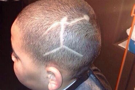 Poor Kid Gets A TERRIBLE Jordan Jumpman Logo Haircut! - Daily Snark