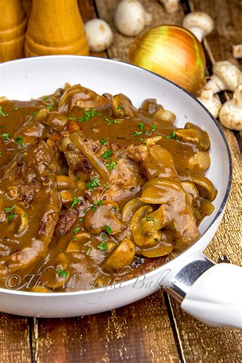 Skillet Pork Chops in Onion Mushroom Gravy - The Midnight Baker