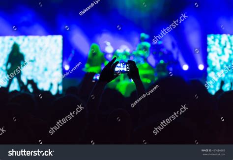 Crowd Of People At A Concert, Dark Silhouettes Stock Photo 457686685 ...