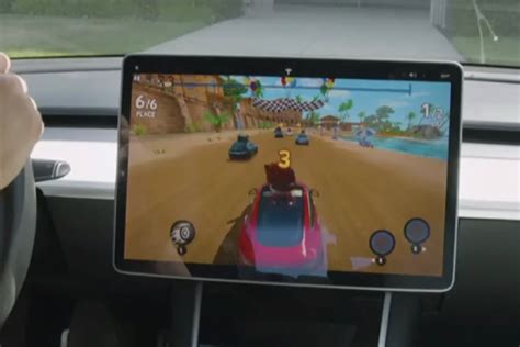 Tesla demos in-car video games, says YouTube is coming too