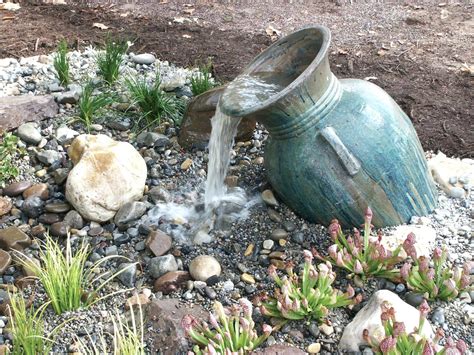 Image result for bubbling rock water features | Garden water fountains, Waterfalls backyard ...