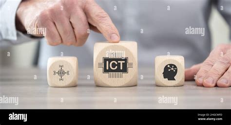 Wooden blocks with symbol of ict concept Stock Photo - Alamy