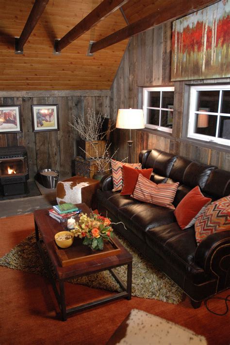 a living room filled with furniture and a fire place in the corner on ...