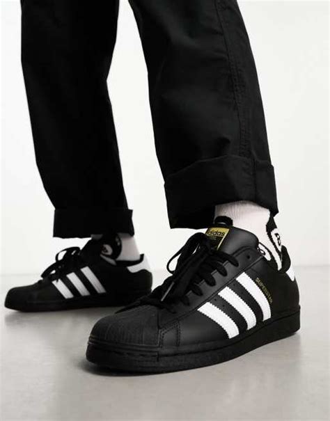 adidas Originals new superstar sneakers in black | ASOS