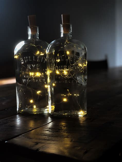 We've got nine clever ways to reuse your favorite empty bourbon bottles around the house ...